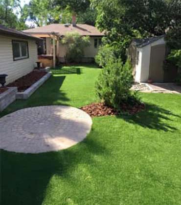 Artificial grass installation in Colorado backyard